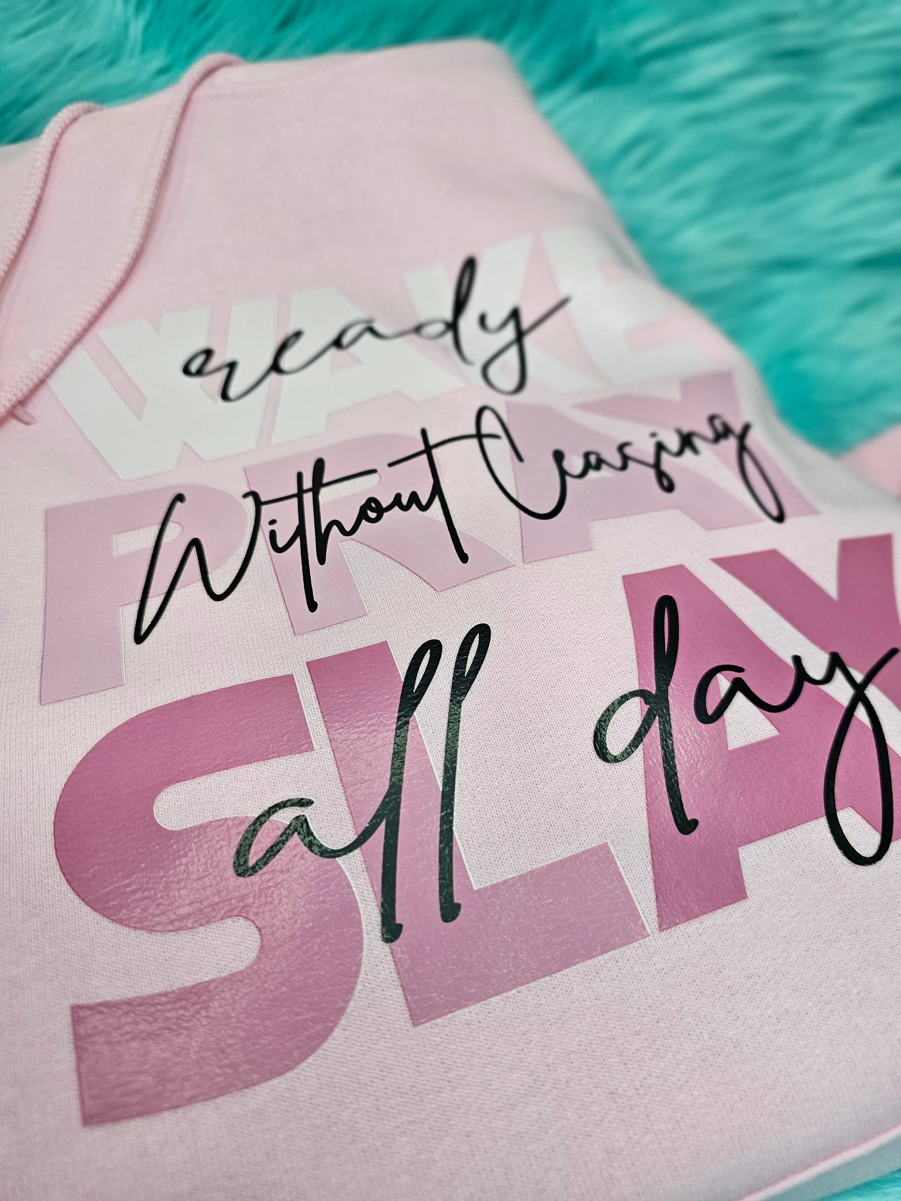 Pink Hoodie with WAKE PRAY SLAY graphics